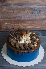 chocolate color drip cream cheese cake with cookies