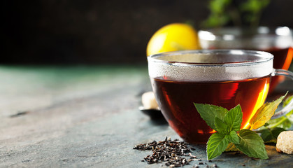 Hot tea cup with mint and sugar