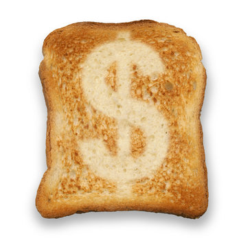 Dollar currency sign burn mark on toast bread, isolated on white background. Slice bread  with dollar sign, concept high price of food or food for business.