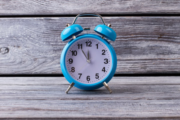 Beautiful blue retro alarm clock.