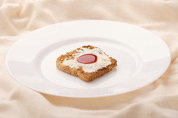 Toast with jam in bed. Good for tea.