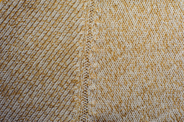 Cream knitted woolen fabric texture