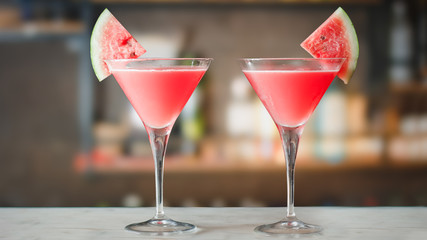 Watermelon Martini cocktails on bar counter.