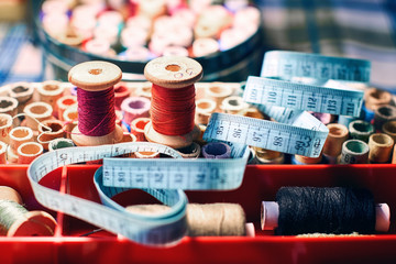 Sewing kit on the table: tape measure, accessories and equipment for needlework
