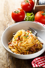 Tomato pasta with egg sauce, cheese and ham
