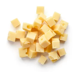 Fotobehang Heap of diced cheese squares from above © bigacis