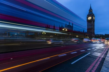 Fotobehang London, England, UK. Red buses blured in motion on Westminster b © Gorilla