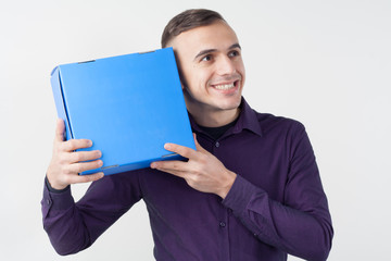 Man with a box. Box with a gift in the men hands.