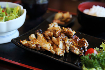 Grilled Chicken teriyaki rice on wood background