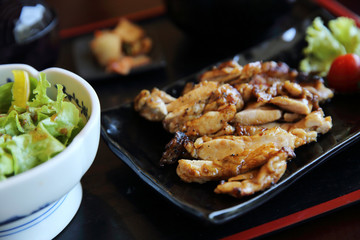 Grilled Chicken teriyaki rice on wood background