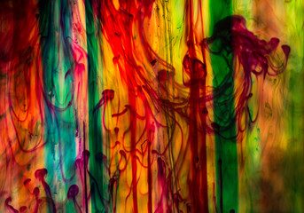 Acrylic colors and ink in water. Abstract background.