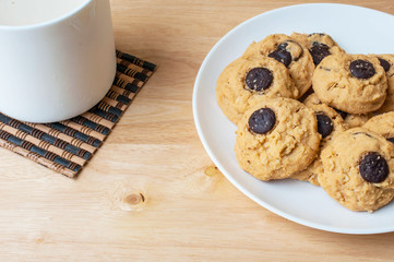 Butter Cookie and milk on wooden table