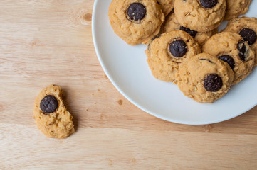 Butter Cookie and milk on wooden table