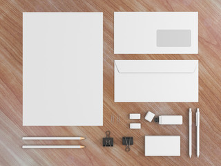 Corporate identity template set. Business stationery mock up with white blank. Branding design. Isolated on wooden background. Letter envelope, card, catalog, pen, pencil, paper. 3d illustration