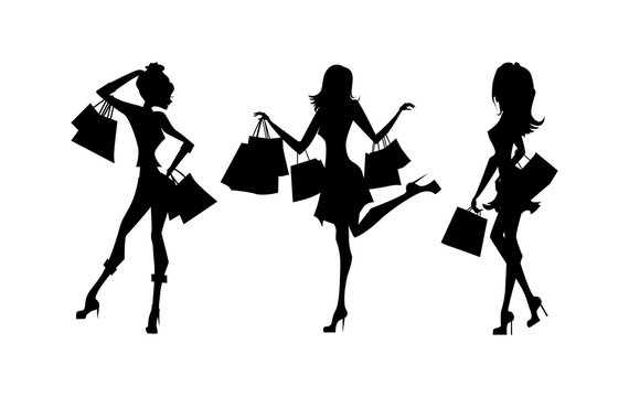 Shopping Sillhouettes Set. Black Sillhouettes Of Women With Shopping Bags On White Background. Elegant, Young And Slim Women.