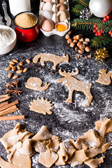 Baking ingredients for Christmas cookies gingerbread. Molds for baking, spices and  decorations for Christmas.