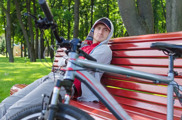 Young man with bicycle