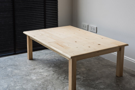 Wood table in modern room,work space