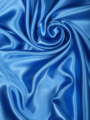 Fototapeta premium Smooth elegant blue silk as background