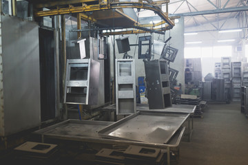 Metallurgy industry interiors. Details from factory for production of boiler stoves. Sector for...
