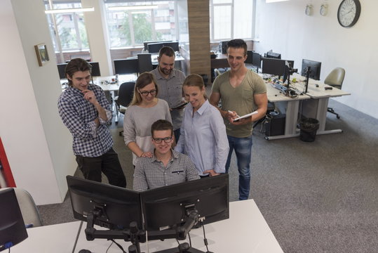 group of young startup business people standing as team
