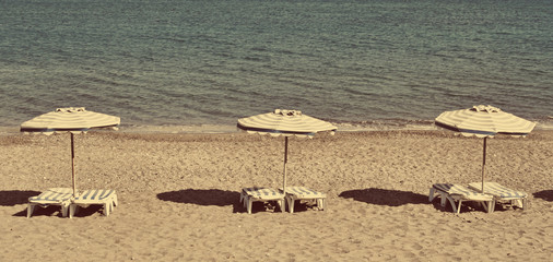Greece. Kos. Kefalos beach. Chairs and umbrellas. In instagram s
