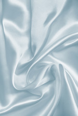 Smooth elegant grey silk or satin texture as background