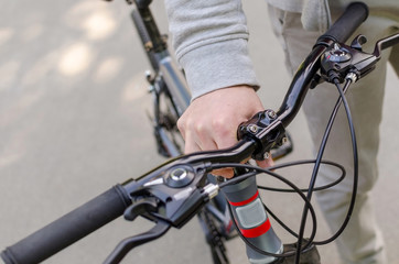 Young man with bicycle