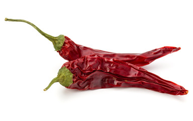 Dried red chili or chilli cayenne pepper isolated on white  back