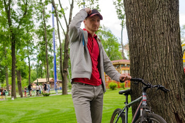 Young man with bicycle