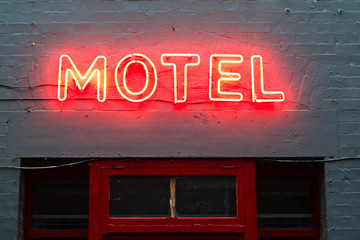 Motel neon sign lit up