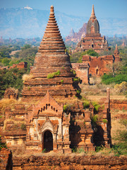 Ancient pagodas valley in Bagan, blue sky in background