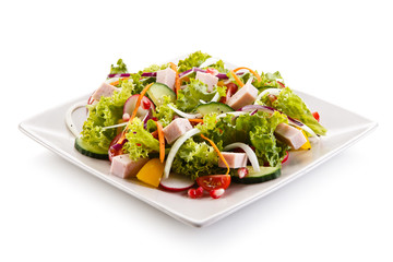 Ham and vegetables on white background