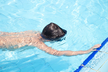 Reach the Goal - Kid touch the edge of swimming pool