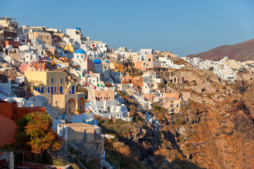Panorama with hotels and villas with sea view in Oia, Santorini,