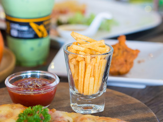 Fried desserts  in glass.  on the wooden table.