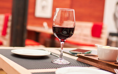 glass of red wine in cafe