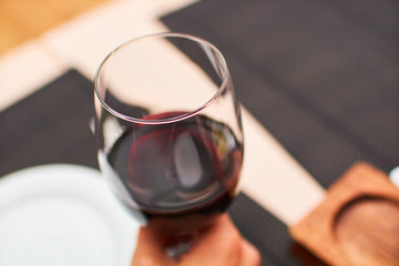 glass of red wine in cafe