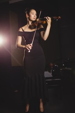 Female student playing violin