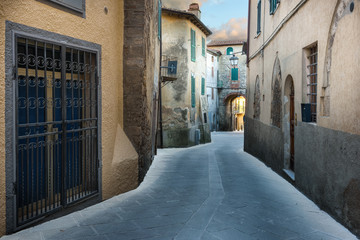 Old alley in a beautiful medieval town, Sarteano in Tuscany, Ita