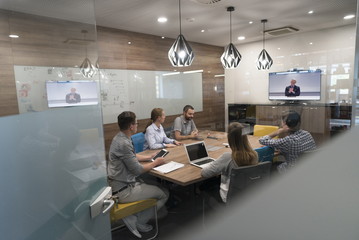 start up business people group attending videoconference call