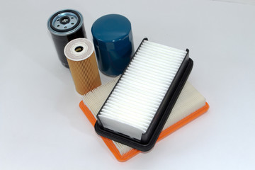 Spare parts for the car.Filter oil, fuel, air  on white background.