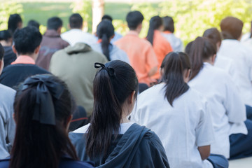 Fototapeta premium Thailand secondary education students are sitting in line for Me
