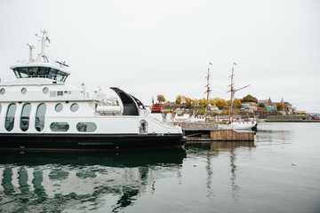 yacht is docked to the pier