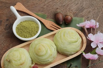 Festival moon cake - Chinese cake and green tea powder.