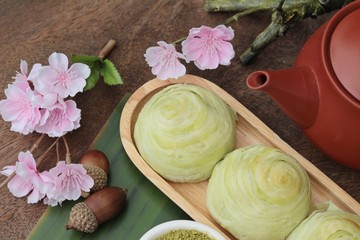 Festival moon cake - Chinese cake and green tea powder.