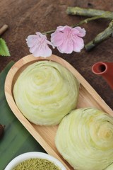 Festival moon cake - Chinese cake and green tea powder.