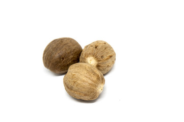 Nutmeg seeds isolated on white