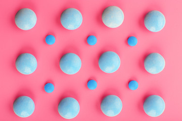 Color pills on pink background