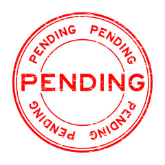 Grunge red pending round rubber stamp for business , decision pu